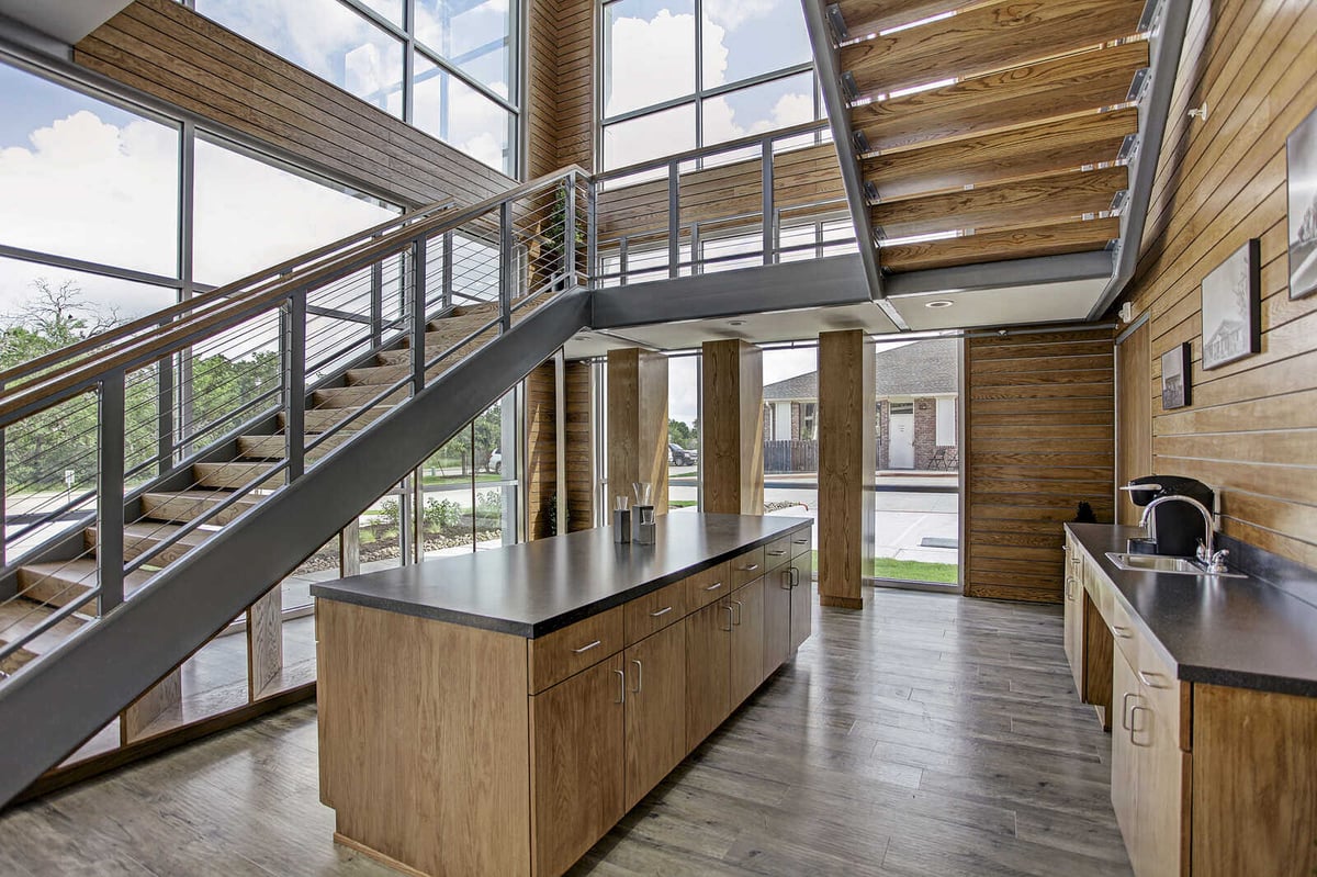 Covered walkway leading to a newly renovated commercial building by GSD Construction in Houston, TX
