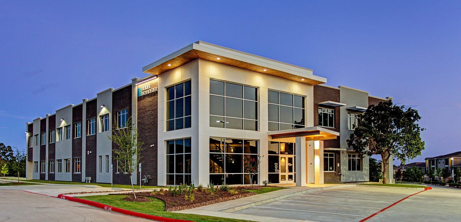 Covered walkway leading to a renovated commercial facility by GSD Construction in Houston, TX